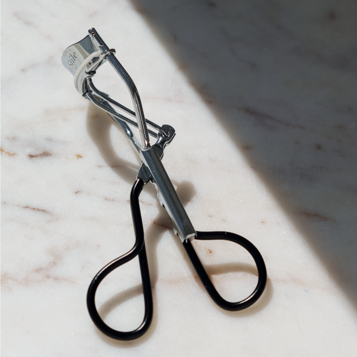 The Eyelash Curler